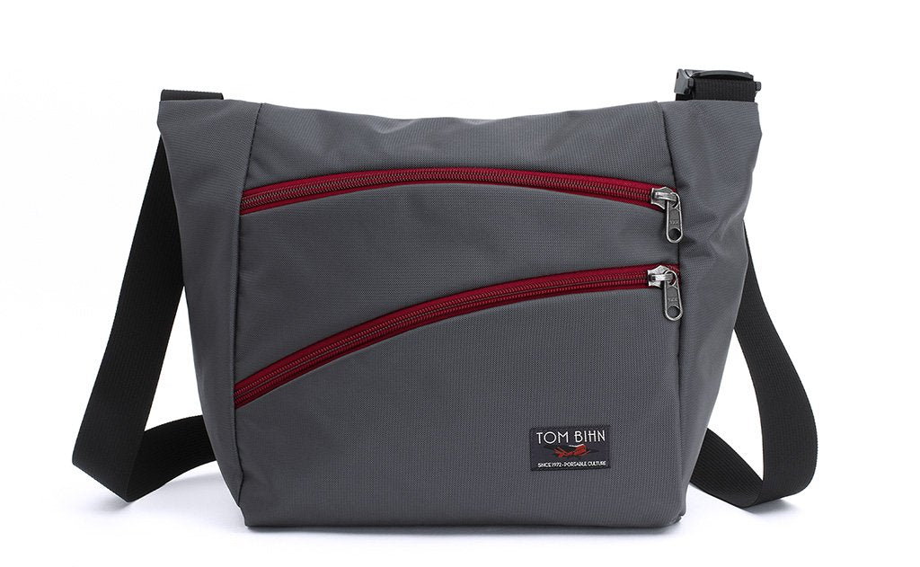 visible variant TB1415-GRIZ^^Icon in Nebulous Grey (dark grey) 525 Ballistic with Iberian (red) zippers.