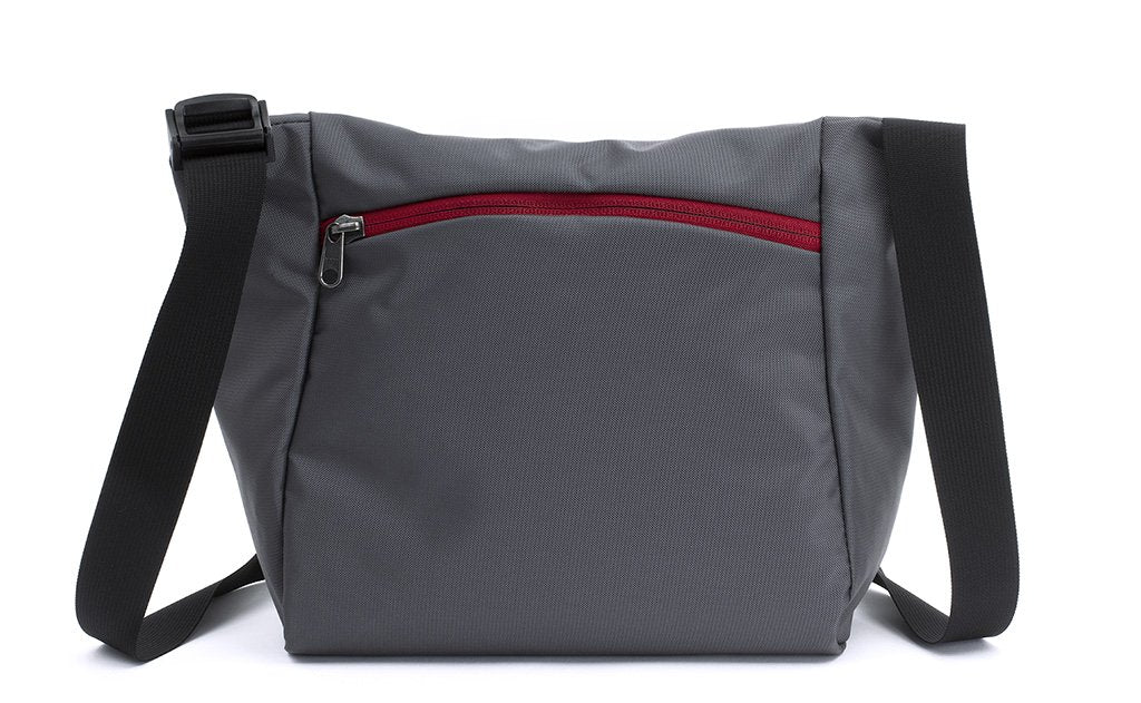 visible variant TB1415-GRIZ^^Reverse shot of an Icon in Nebulous Grey (dark grey) 525 Ballistic with Iberian (red) zippers.