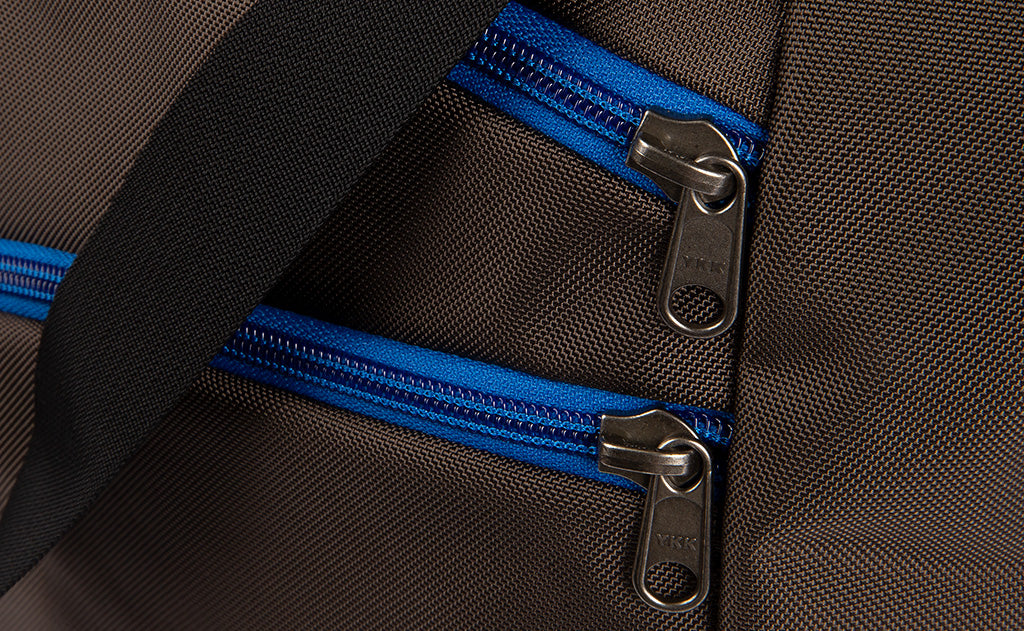 Detail visible^^Close shot of the front pocket zippers.