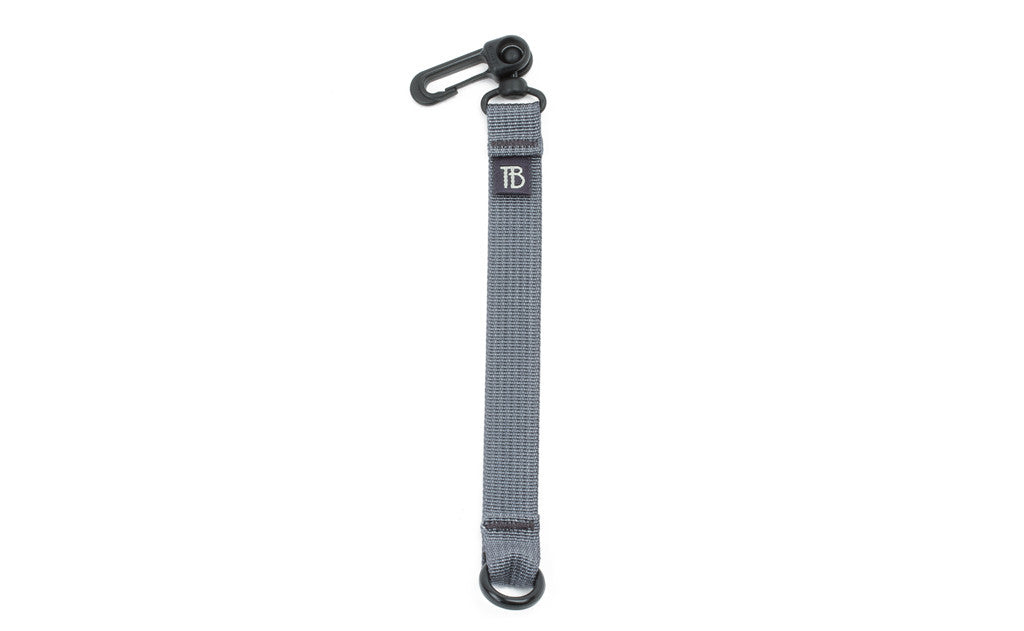 visible variant TB0515-NA^^An 8-inch Northwest Sky (light grey) Key Strap with a snaphook at one end and an o-ring at the other.