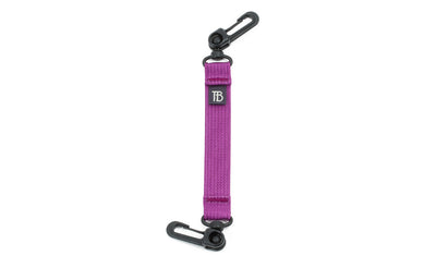 visible variant TB0513-UA^^An 8-inch Ultraviolet (purple) Key Strap with a snaphook at either end.
