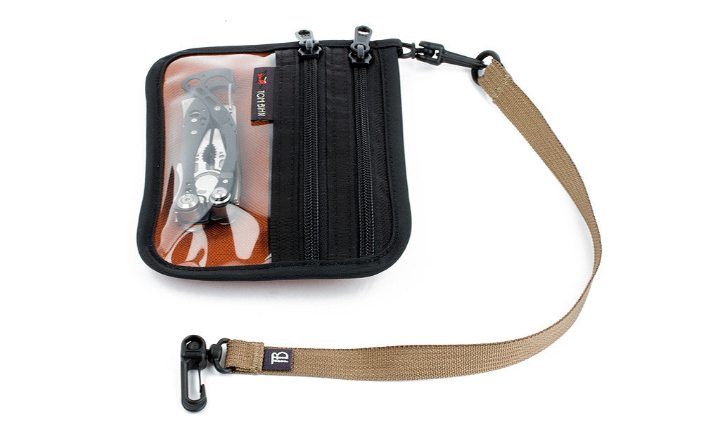 visible variant TB0516-BA TB0516-CA TB0516-ND TB0516-SD TB0516-UD TB0516-WD TB0516-ID^^A 16-inch Key Strap with a snaphook at one end and an o-ring at the other attached to a Double Organizer Pouch.