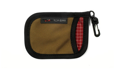 visible variant TB1229-CBID^^A Pocket Pouch in Coyote with a Iberian interior.