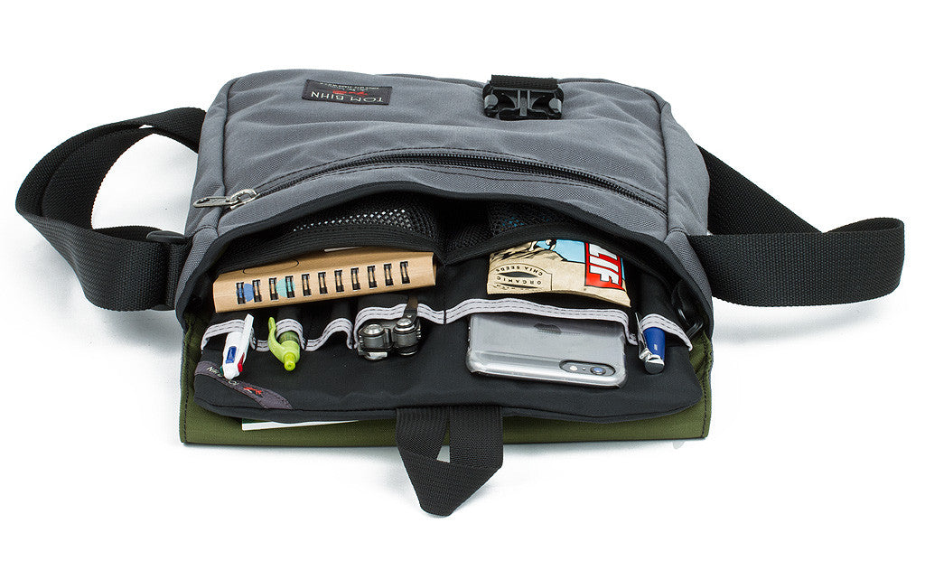 A shot of the Medium Cafe Bag with a Medium Cafe Freudian Slip in the main compartment.