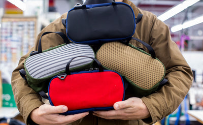 detail visible^^Person holding a variety of Grab Bags.