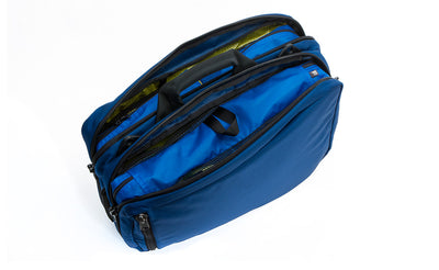 detail visible^^A Western Flyer holding two Small Packing Cubes and one Large Packing Cube, all in Island (blue) 120 Aether.