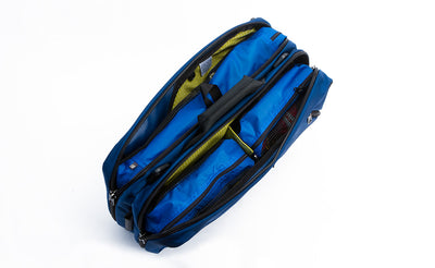 detail visible^^A Western Flyer holding two Small Packing Cubes and one Large Packing Cube, all in Island (blue) 120 Aether.