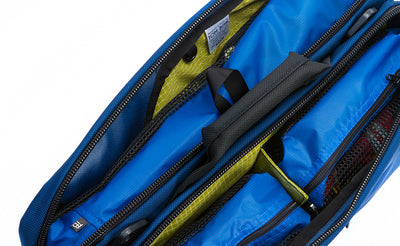 detail visible^^A Western Flyer holding two Small Packing Cubes and one Large Packing Cube, all in Island (blue) 120 Aether.