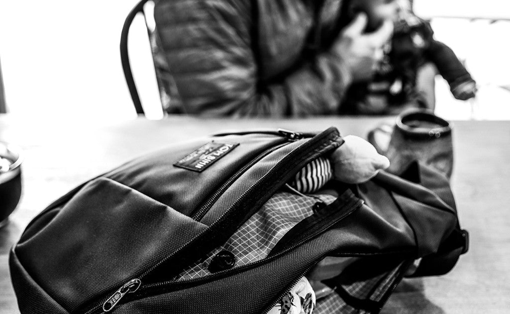 lifestyle visible^^A Parental Unit with a toy in the front pocket.