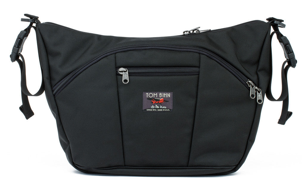 visible^^A pair of stroller/wheelchair adapter straps attached to the shoulder strap d-rings of a Parental Unit in Black 525 Ballistic.