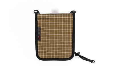 visible variant TB0931-CD TB0932-CD^^The Passport Pouch in Coyote (brown with white grid) 200 Halcyon.