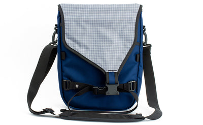 visible variant TB0243-DKND^^The Ristretto in Deep Blue (dark blue) 525 Ballistic with Northwest Sky (light grey with white grid) 200 Halcyon interior.