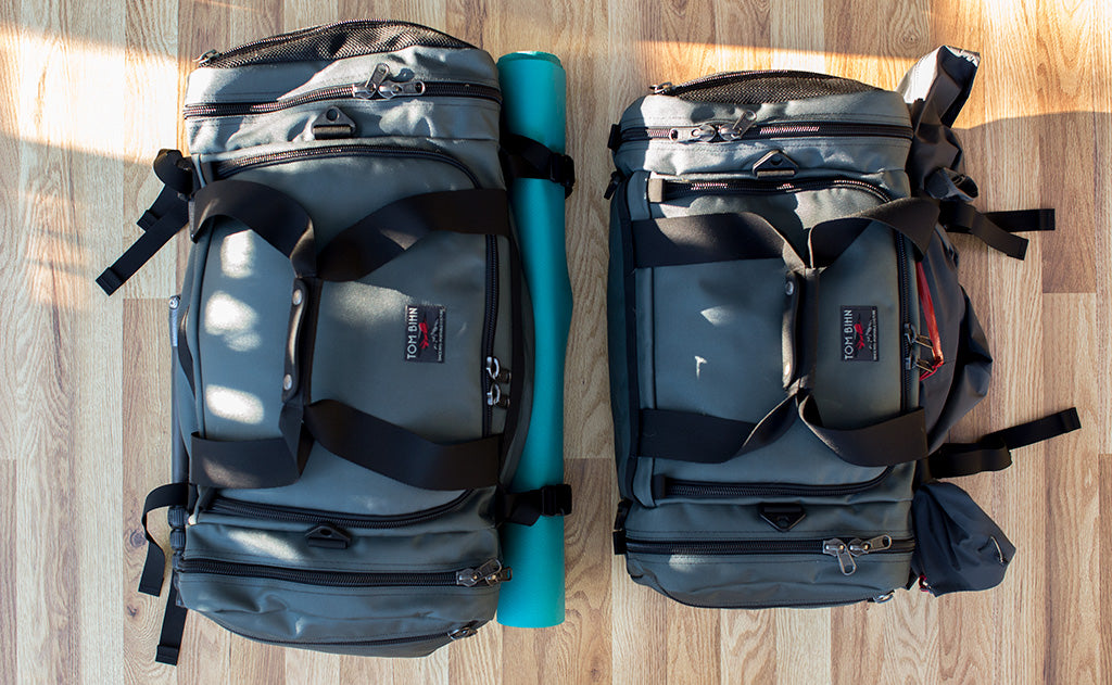 lifestyle visible^^The Road Buddy Lash Straps holding a rolled yoga mat.