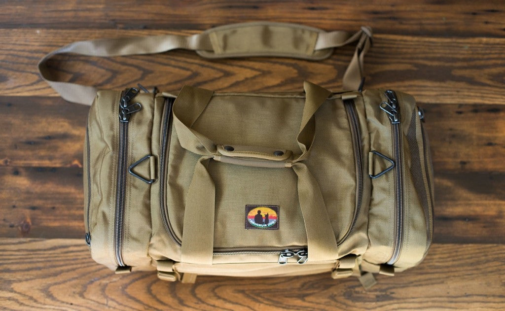 visible variant SD5412-CBCN^^The Medium Skookum Dog Road Duffel in Coyote (tan) 1050 Ballistic.