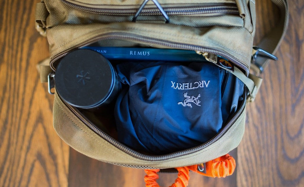 lifestyle visible^^A close shot of the end pocket on a Medium Road Duffel.