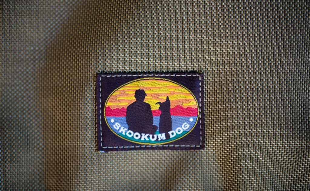 detail visible^^A close shot of the logo on a Medium Road Duffel.