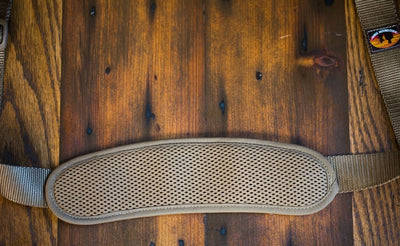 detail visible^^A reverse shot of the included shoulder strap of the Medium Road Duffel showing the mesh underside.