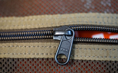 detail visible^^A close shot of a zipper on the Medium Road Duffel.