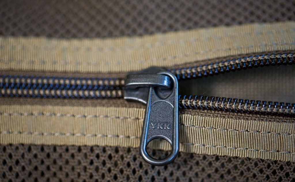 detail visible^^A close shot of a zipper on the Large Road Duffel.