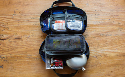 ^^Interior shot of a filled Second Aid Pouch in Blue