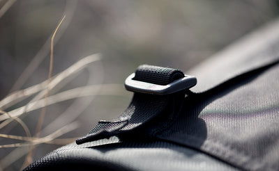 detail visible^^Tri-glide adjuster on the closure strap of an Original Shadow Guide 31.