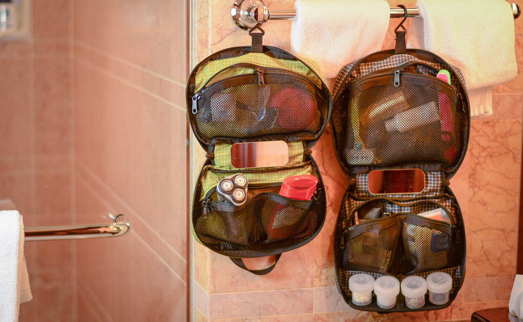 detail visible^^A Standard Spiff Kit next to a Deluxe Spiff Kit. hung on a towel rack