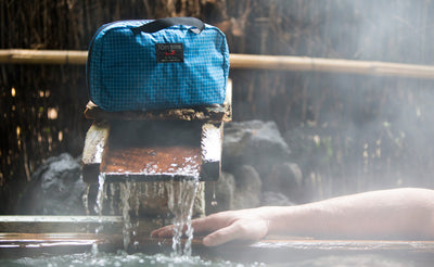visible lifestyle^^The Standard Spiff Kit on the edge of a hot spring.