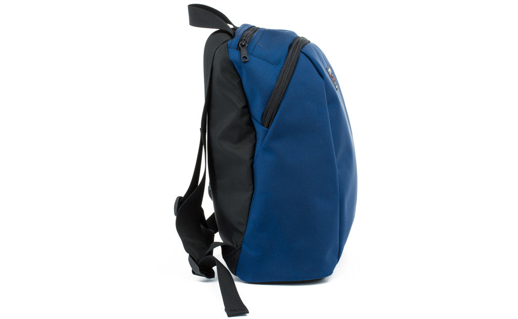 visible variant TB0106-NB7D^^A profile shot of The Sprout in Navy (blue) 1050 Ballistic.