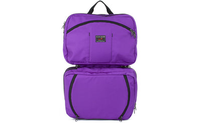 visible variant TB0975-AKDJ^^The Stowaway in Alphaviolet (bright purple) 525 Ballistic with the center compartment opened.