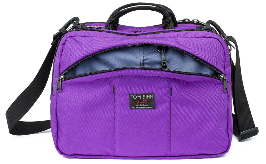 visible variant TB0975-AKDJ^^The Stowaway in Alphaviolet (bright purple) 525 Ballistic with a Cloud (light grey) 210 Ballistic interior.