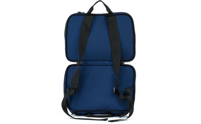 visible variant TB0975-DKGJ^^The Stowaway in Deep Blue (dark blue) 525 Ballistic with the center compartment open to access the backpack straps.