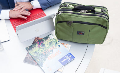 lifestyle visible^^A person with their Stowaway on a table while they're using their tablet.