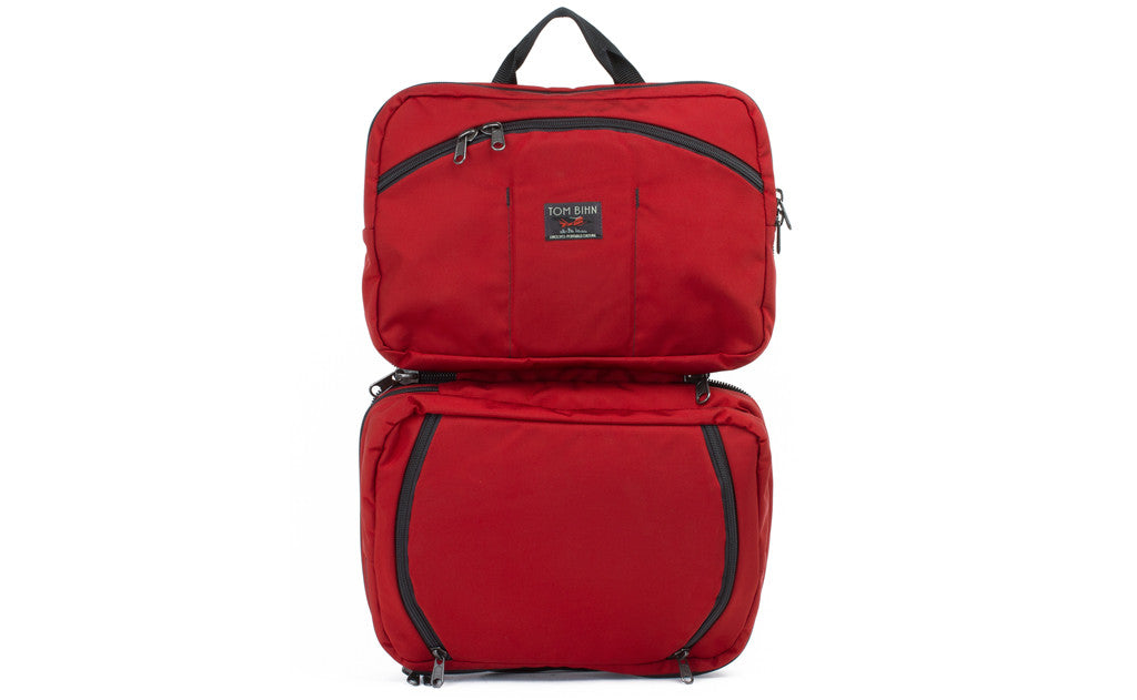 visible variant TB0975-MKLJ^^The Stowaway in Mars Red 525 Ballistic with the center compartment opened.