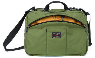 visible variant TB0975-OKYJ^^The Stowaway in Olive (green) 525 Ballistic with a Canyon (goldenrod yellow) 210 Ballistic interior..