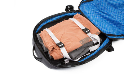 detail visible^^The lash straps of the main compartment of the Synik 30 holding some clothes in place.