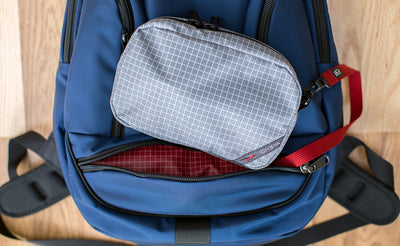 lifestyle visible^^An All-Fabric 3D Organizer Cube attached via a Key Strap to a Synapse 19.