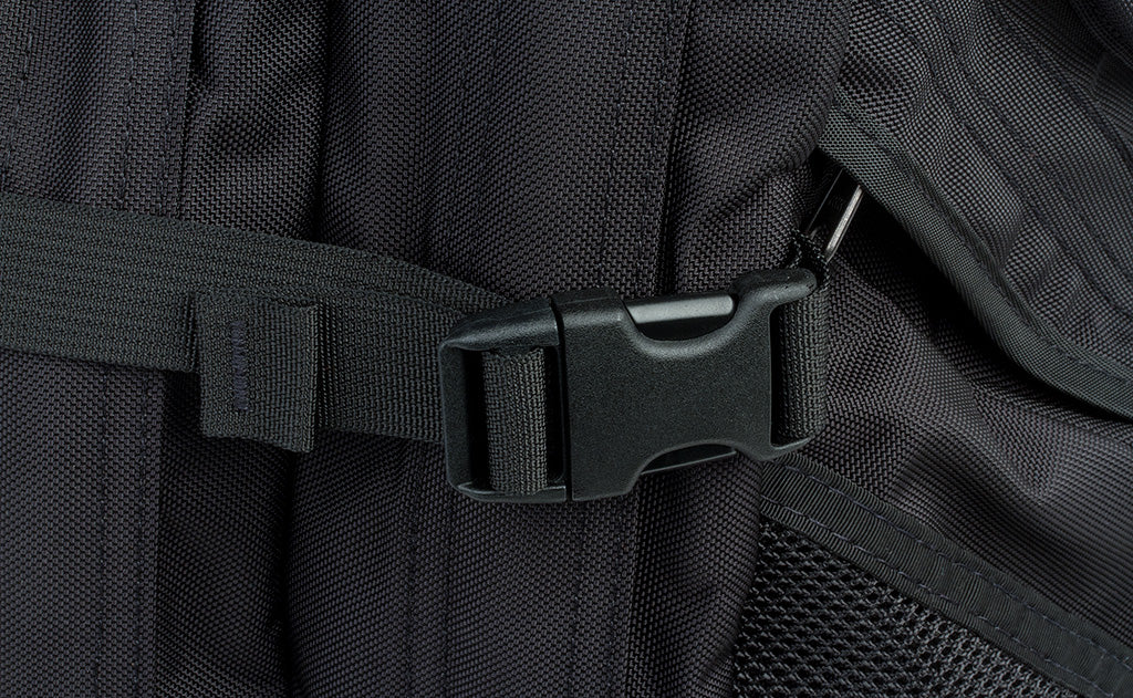 detail visible^^A close shot of one of the side cinches buckled up and cinched down.