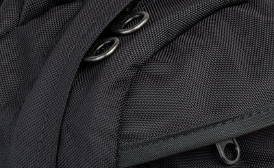 detail visible^^A close shot of the zipper pulls under the zipper flap.