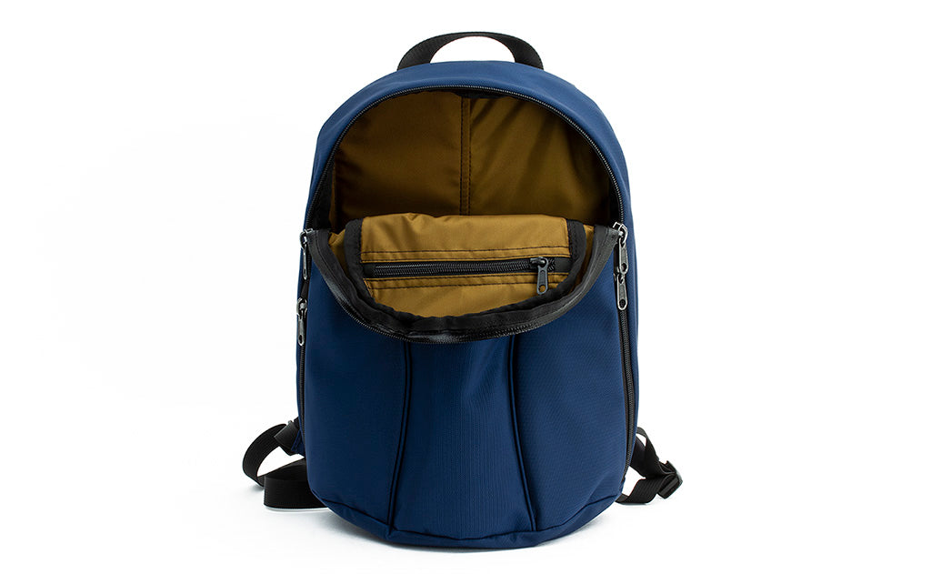 visible variant TB0107-DKCJ^^The Luminary 12 in Deep Blue (dark blue) 525 Ballistic with Coyote (brown) 210 Ballistic interior.