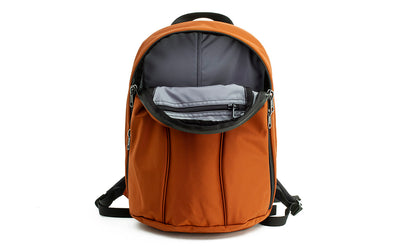 visible variant TB0107-TKLJ^^The Luminary 12 in Burnt Orange 525 Ballistic with a Cloud (light grey) 210 Ballistic interior.