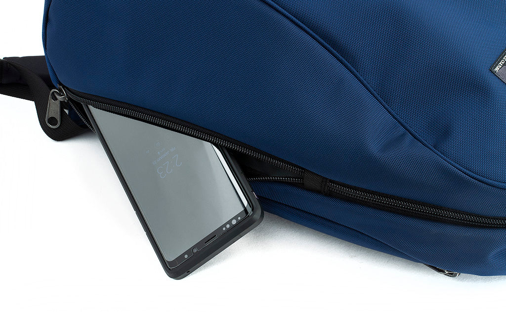 detail visible^^A phone in the small side pocket of the Luminary 12.