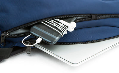 detail visible^^A small laptop in the padded pocket of the Luminary 12 and a phone in the small side pocket of the Luminary 12.