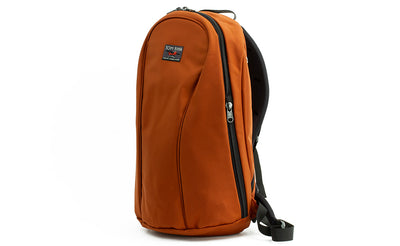 visible variant TB0108-TKLJ^^A profile shot of the Luminary 15 in Burnt Orange 525 Ballistic.