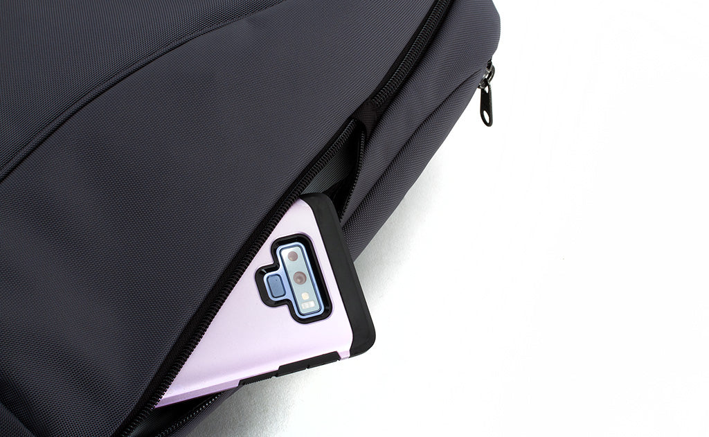 detail visible^^A phone in the small side pocket.