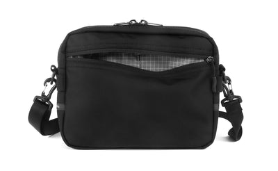 visible variant TB0414-BKND^^The Side Kick in Black Ballistic with an Northwest Sky (light grey with white grid) 200 Halcyon interior.