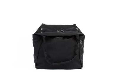detail visible^^The Pop Tote with its handles folded down.