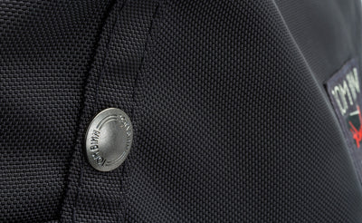 detail visible^^A close shot of the metal snaps on the Pop Tote
