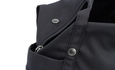 detail visible^^A close shot of the metal snaps and zipper on the Pop Tote.