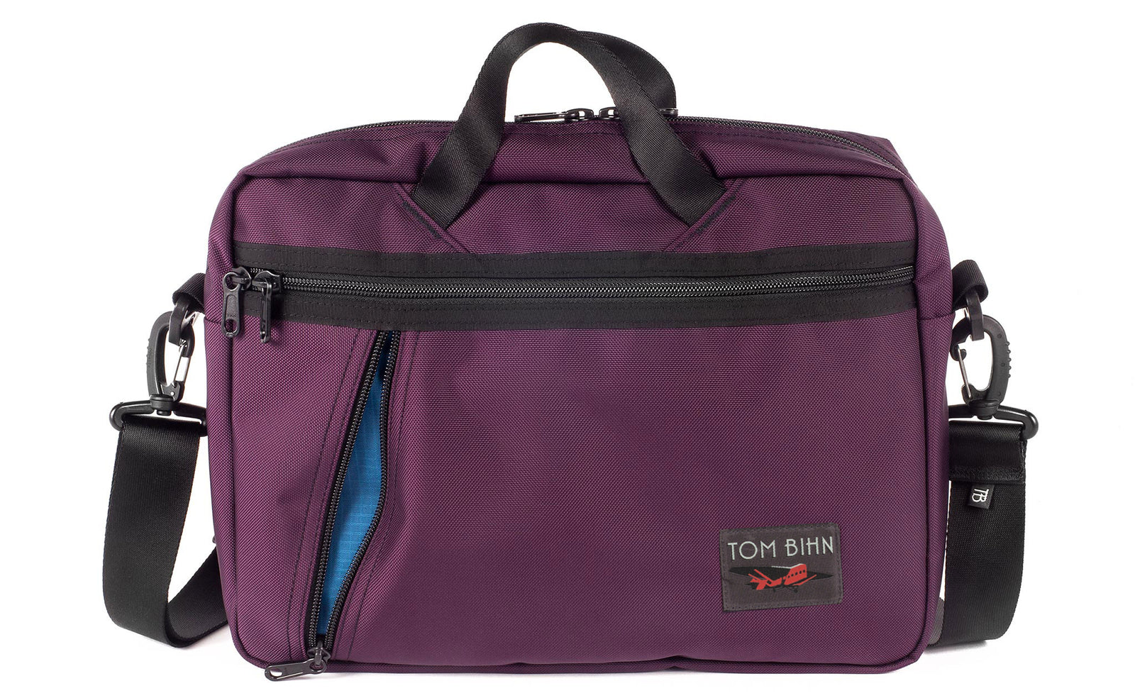 visible variant TB0722-UKOL^^Daylight Briefcase in Aubergine (dark purple) 525 Ballistic with Cobalt (blue) 210 Cerylon interior