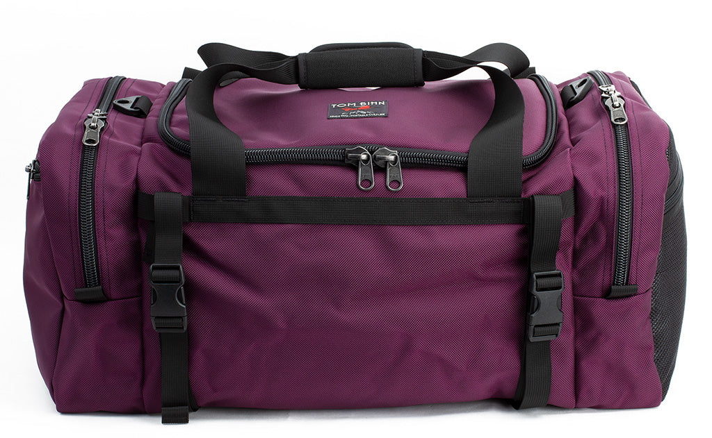 visible variant TB0851-ABLJ^^The Road Buddy Duffel 60 in Aubergine (dark purple) 1050 Ballistic.